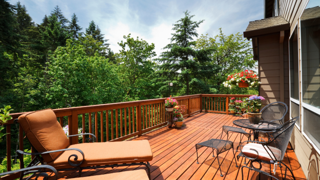 A backyard deck in the summer